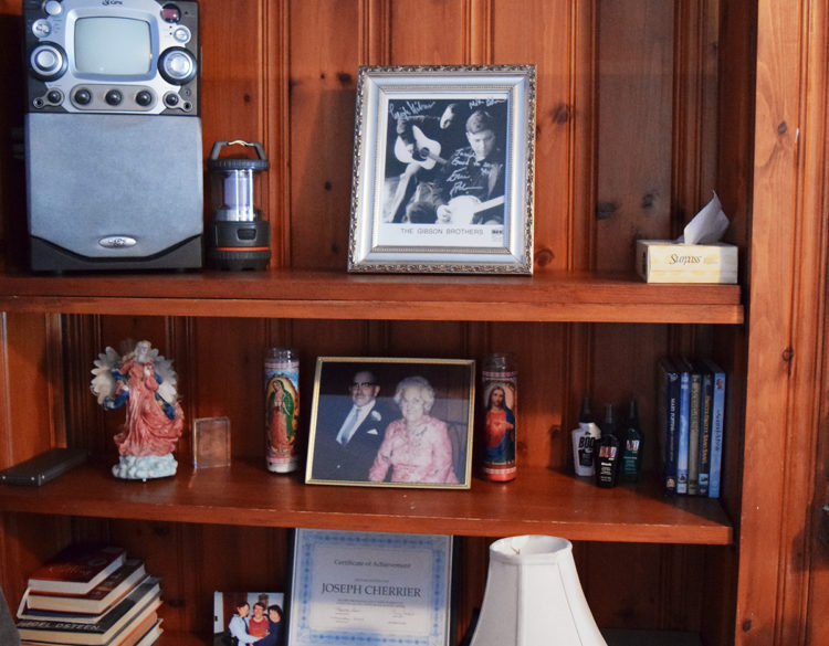 Shelf with family pictures