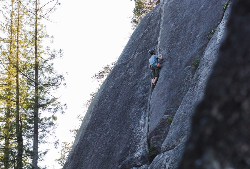 Rock climber scaling a wall