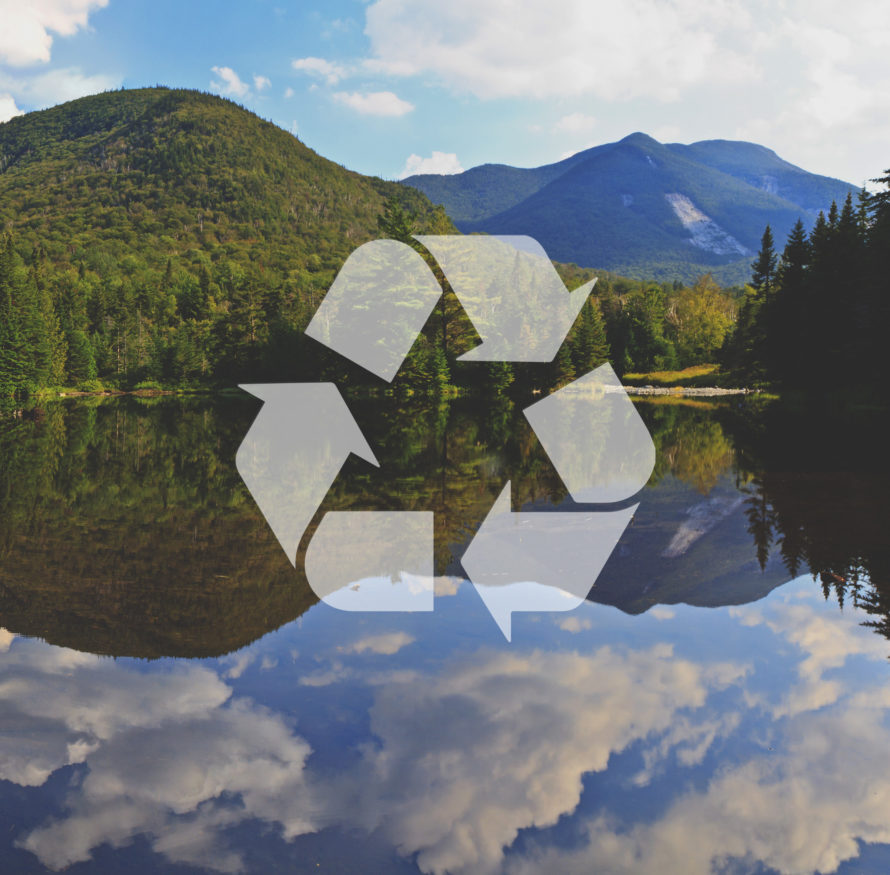 beautiful nature lake scene with recycle symbol on it