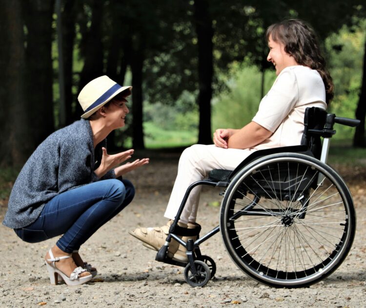 A Direct Support Professional providing support and assistance to a person with a disability answers the question "what is a direct support professional?"