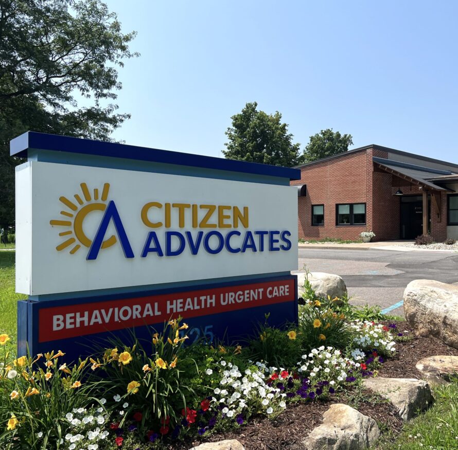 The Malone Behavioral Health Urgent Care Center on a spring day, symbolizing mental health support and addiction recovery.