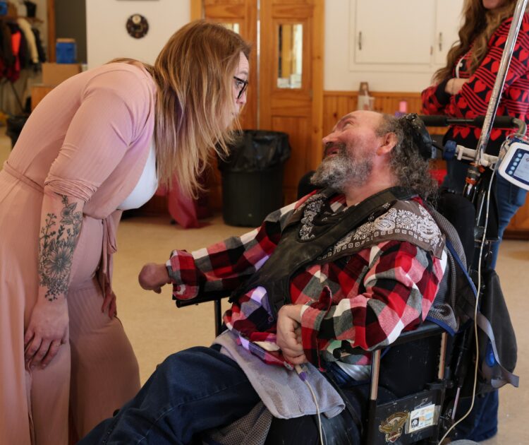 An OPWDD Supervised and Supportive Housing participant enjoys a Valentine's Party.